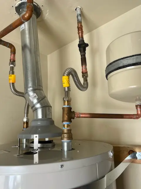 Water heater installation and plumbing repair in Stuck
